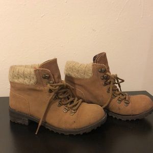 brown boots with sweater material accents